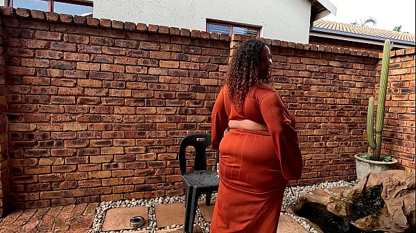 SA colored BBW chain smoking cigarettes naked outside in the garden